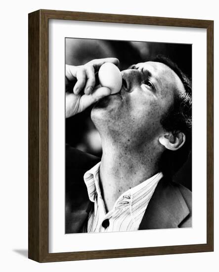 Renzo Arbore Drinking a Fresh Egg-null-Framed Photographic Print