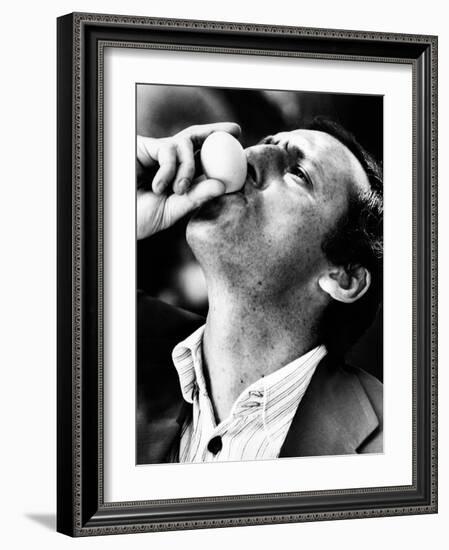 Renzo Arbore Drinking a Fresh Egg-null-Framed Photographic Print