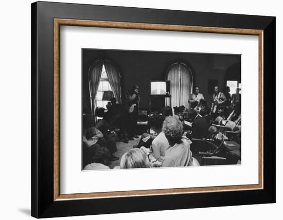 Reporters watch President Carter making TV announcement on aborted Iran rescue, 1980-Marion S. Trikosko-Framed Photographic Print