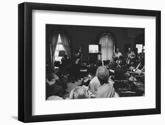 Reporters watch President Carter making TV announcement on aborted Iran rescue, 1980-Marion S. Trikosko-Framed Photographic Print