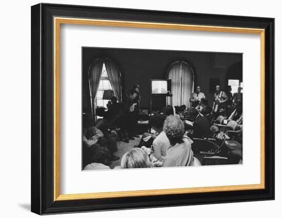 Reporters watch President Carter making TV announcement on aborted Iran rescue, 1980-Marion S. Trikosko-Framed Photographic Print