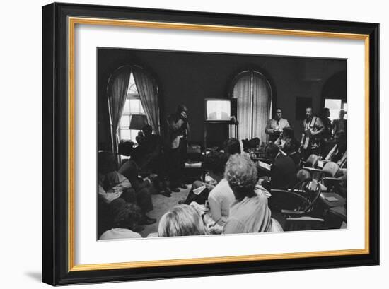 Reporters watch President Carter making TV announcement on aborted Iran rescue, 1980-Marion S. Trikosko-Framed Photographic Print