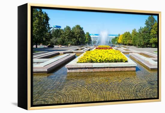 Republic Square Park, water spraying from fountain, Almaty, Kazakhstan, Central Asia, Asia-G&M Therin-Weise-Framed Premier Image Canvas