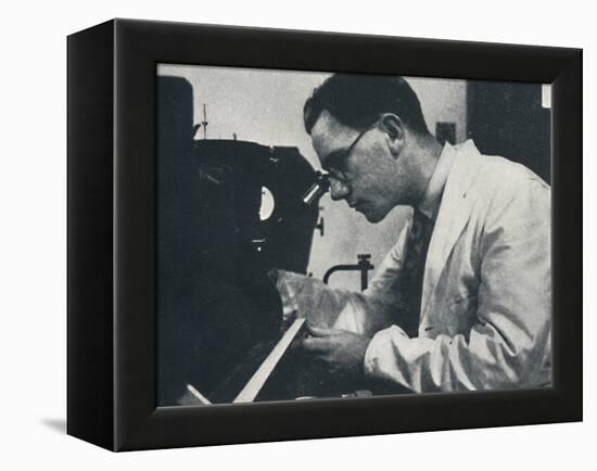 'Research worker with microscope (testing the structure of an aluminium alloy)', 1941-Cecil Beaton-Framed Premier Image Canvas