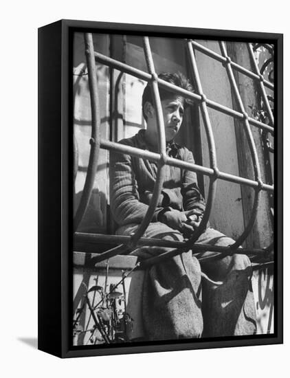 Resident of Italian Boystown Sitting in Barred Windowsill as Punishment For Wasting Bread-Hans Wild-Framed Premier Image Canvas