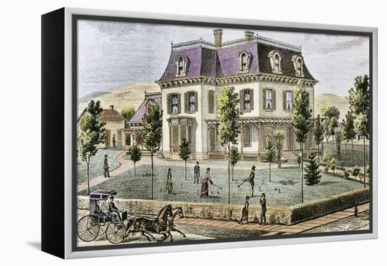 Residential Home with the Family Playing Cricket.-Tarker-Framed Premier Image Canvas