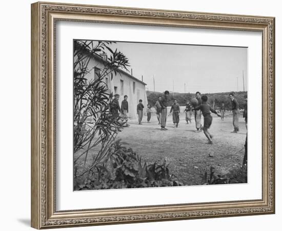 Residents of Italian Boystown Playing Soccer-null-Framed Photographic Print