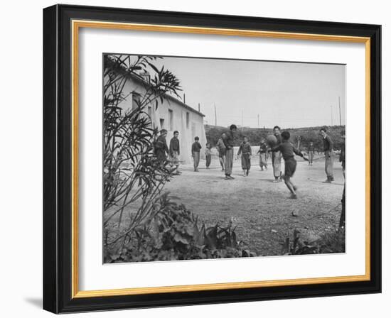 Residents of Italian Boystown Playing Soccer-null-Framed Photographic Print