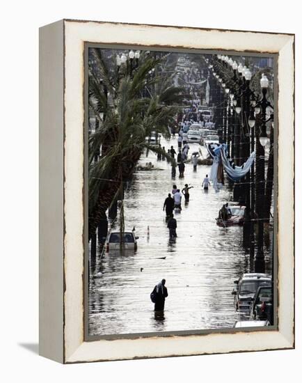 Residents Walk Through Floodwaters on Canal Street-null-Framed Premier Image Canvas