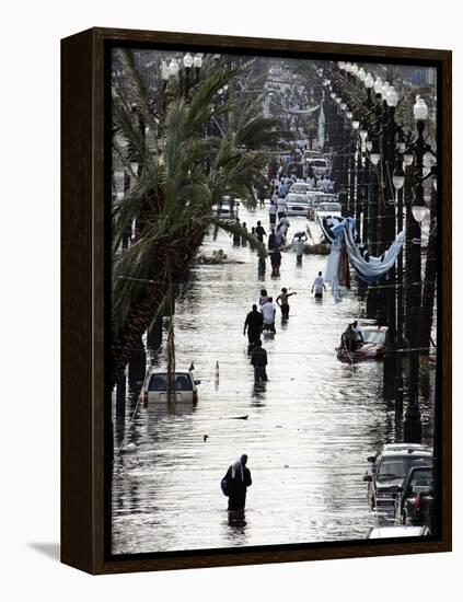 Residents Walk Through Floodwaters on Canal Street-null-Framed Premier Image Canvas