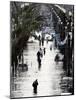 Residents Walk Through Floodwaters on Canal Street-null-Mounted Photographic Print