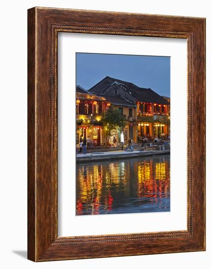 Restaurants reflected in Thu Bon River at dusk, Hoi An, Vietnam-David Wall-Framed Photographic Print