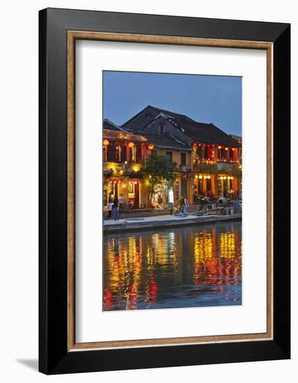 Restaurants reflected in Thu Bon River at dusk, Hoi An, Vietnam-David Wall-Framed Photographic Print