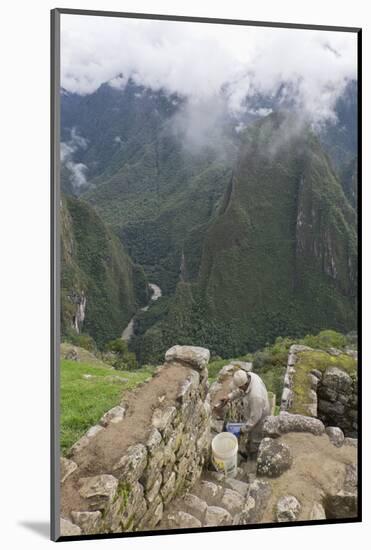 Restoration work at the Inca ruins of Machu Picchu, UNESCO World Heritage Site, Peru, South America-Julio Etchart-Mounted Photographic Print