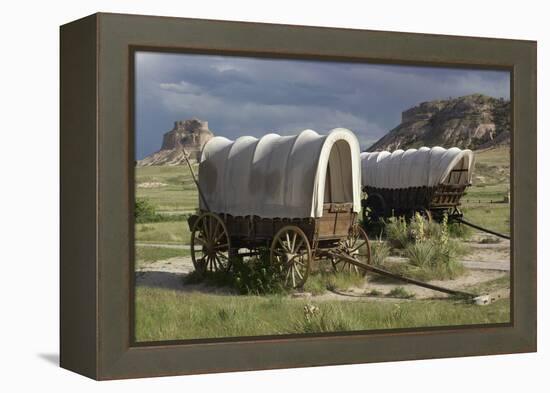 Restored Covered Wagons (Conestoga Wagon at Rear), at Scotts Bluff on the Oregon Trail in Nebraska-null-Framed Premier Image Canvas