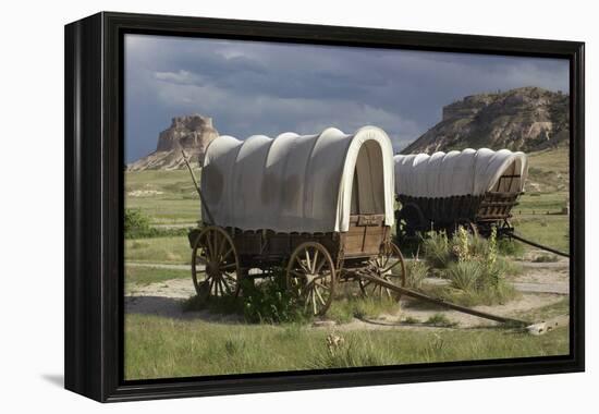 Restored Covered Wagons (Conestoga Wagon at Rear), at Scotts Bluff on the Oregon Trail in Nebraska-null-Framed Premier Image Canvas