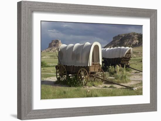 Restored Covered Wagons (Conestoga Wagon at Rear), at Scotts Bluff on the Oregon Trail in Nebraska-null-Framed Photographic Print