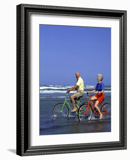 Retired Couple Riding Bikes at the Beach-Bill Bachmann-Framed Photographic Print