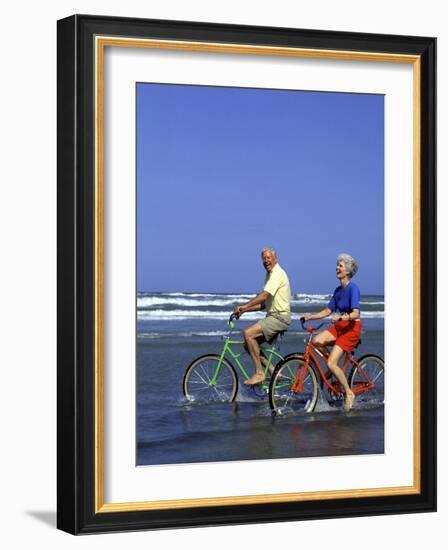 Retired Couple Riding Bikes at the Beach-Bill Bachmann-Framed Photographic Print