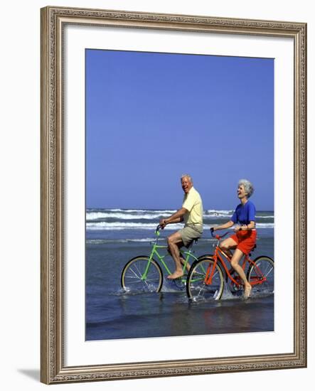 Retired Couple Riding Bikes at the Beach-Bill Bachmann-Framed Photographic Print