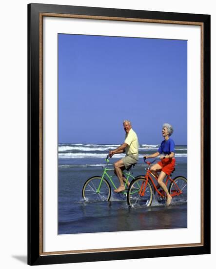 Retired Couple Riding Bikes at the Beach-Bill Bachmann-Framed Photographic Print
