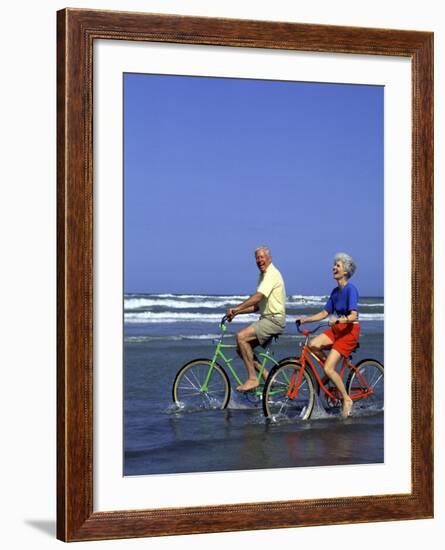 Retired Couple Riding Bikes at the Beach-Bill Bachmann-Framed Photographic Print