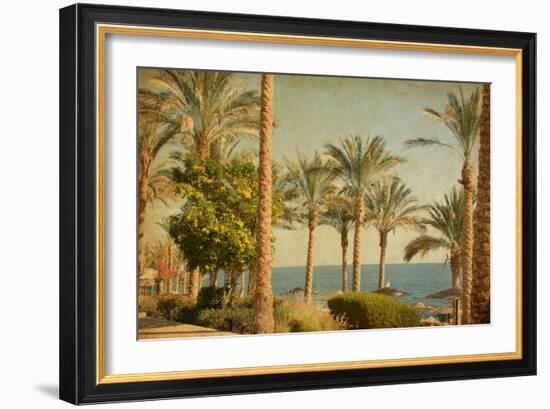 Retro Image Of Beach With Date Palms Amid The Blue Sea And Sky. Paper Texture-A_nella-Framed Art Print