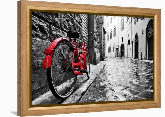 Retro Vintage Red Bike on Cobblestone Street in the Old Town. Color in Black and White. Old Charmin-Michal Bednarek-Framed Premier Image Canvas