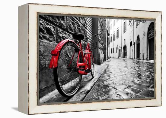 Retro Vintage Red Bike on Cobblestone Street in the Old Town. Color in Black and White. Old Charmin-Michal Bednarek-Framed Premier Image Canvas