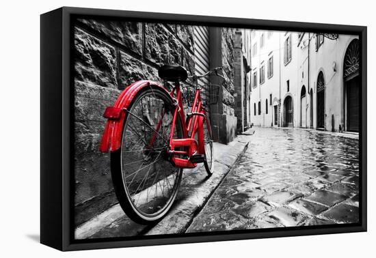 Retro Vintage Red Bike on Cobblestone Street in the Old Town. Color in Black and White. Old Charmin-Michal Bednarek-Framed Premier Image Canvas