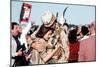 Returning US Soldier Hugs Loved One Amid Other Celebrating Families and Friends-null-Mounted Photo