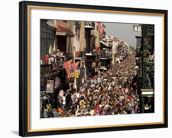 Revelers Pack the French Quarter's Famous Bourbon Street During the Annual Mardi Gras Celebration-null-Framed Photographic Print