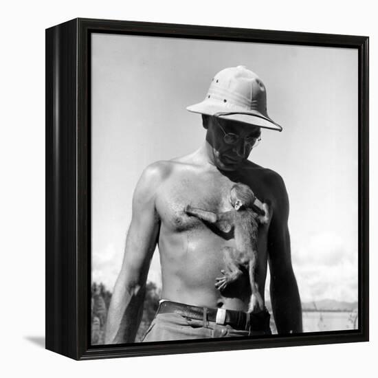 Rhesus Monkey Climbing on a Man's Chest at a Monkey Colony-Hansel Mieth-Framed Premier Image Canvas