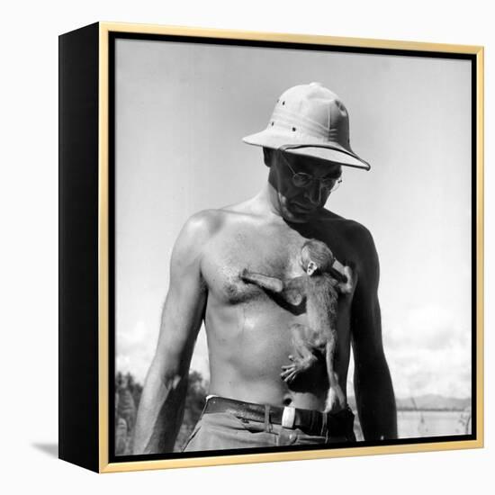 Rhesus Monkey Climbing on a Man's Chest at a Monkey Colony-Hansel Mieth-Framed Premier Image Canvas