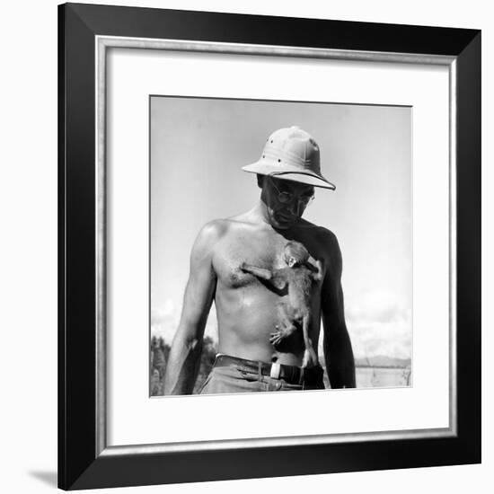 Rhesus Monkey Climbing on a Man's Chest at a Monkey Colony-Hansel Mieth-Framed Premium Photographic Print