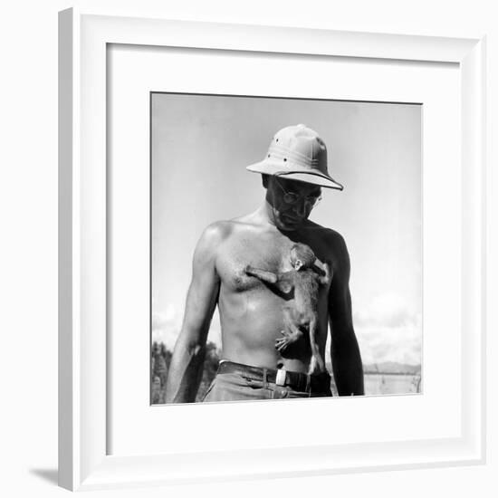 Rhesus Monkey Climbing on a Man's Chest at a Monkey Colony-Hansel Mieth-Framed Premium Photographic Print