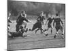 Rhodes Scholar Peter Dawkins of the Us Playing Rugby with Oxford Univ. Students-null-Mounted Photographic Print