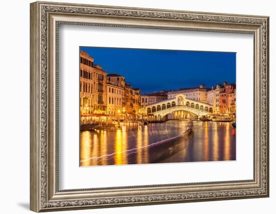 Rialto Bridge (Ponte di Rialto) at night with boat light trails on the Grand Canal, Venice, Veneto-Neale Clark-Framed Photographic Print