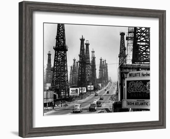 Ribbon of Highway Passing the Signal Hill Oil Field Near Long Beach-Andreas Feininger-Framed Photographic Print