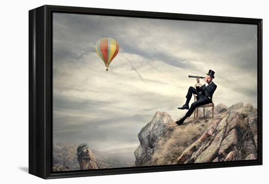 Rich Businessman Sitting On A Chair In The Mountain Looking The Landscape With Spyglass-olly2-Framed Stretched Canvas