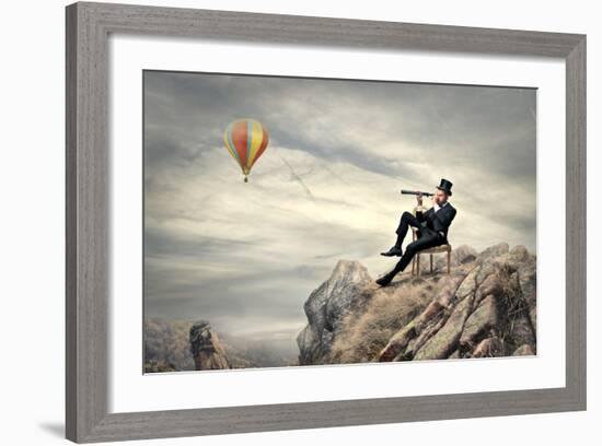 Rich Businessman Sitting On A Chair In The Mountain Looking The Landscape With Spyglass-olly2-Framed Premium Giclee Print