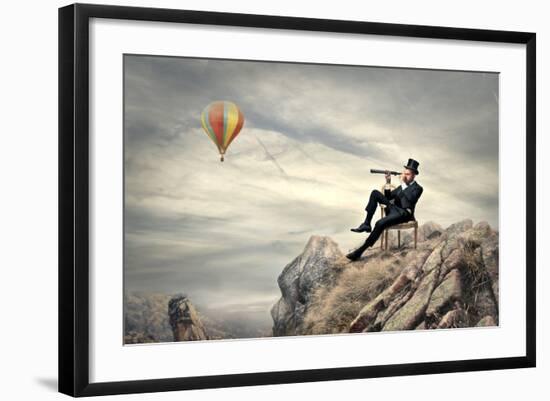 Rich Businessman Sitting On A Chair In The Mountain Looking The Landscape With Spyglass-olly2-Framed Premium Giclee Print
