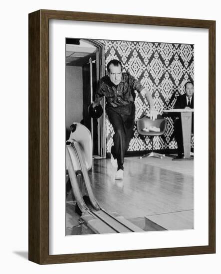 Richard Nixon Bowling at the White House Bowling Alley, 1970-null-Framed Photo