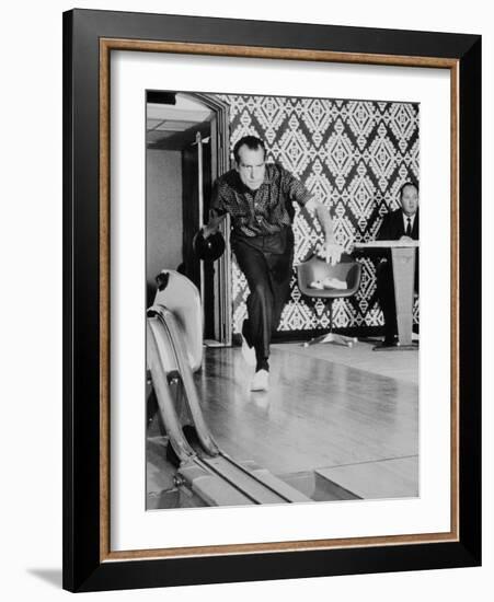 Richard Nixon Bowling at the White House Bowling Alley, 1970-null-Framed Photo