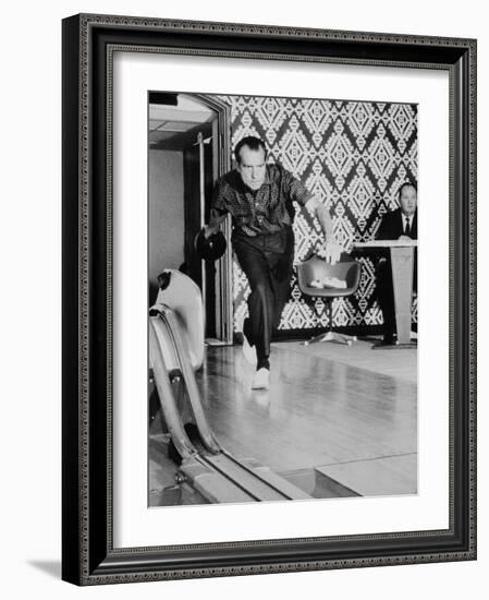 Richard Nixon Bowling at the White House Bowling Alley, 1970-null-Framed Photo