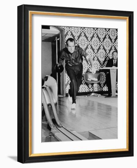 Richard Nixon Bowling at the White House Bowling Alley, 1970-null-Framed Photo