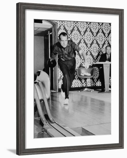 Richard Nixon Bowling at the White House Bowling Alley, 1970-null-Framed Photo