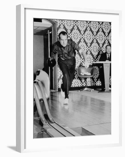 Richard Nixon Bowling at the White House Bowling Alley, 1970-null-Framed Photo