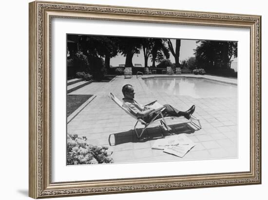 Richard Nixon Reading Newspapers While Sitting by the Pool in San Clemente, Ca. 1969-74-null-Framed Photo