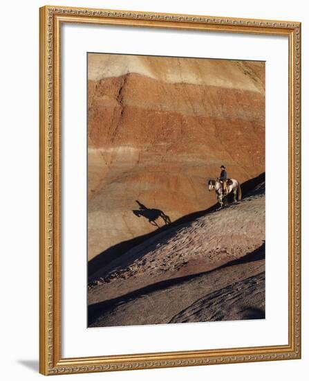 Rider with Shadow Coming down Hill in Painted Desert-Terry Eggers-Framed Photographic Print